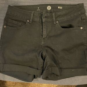 Juniors black denim shorts.